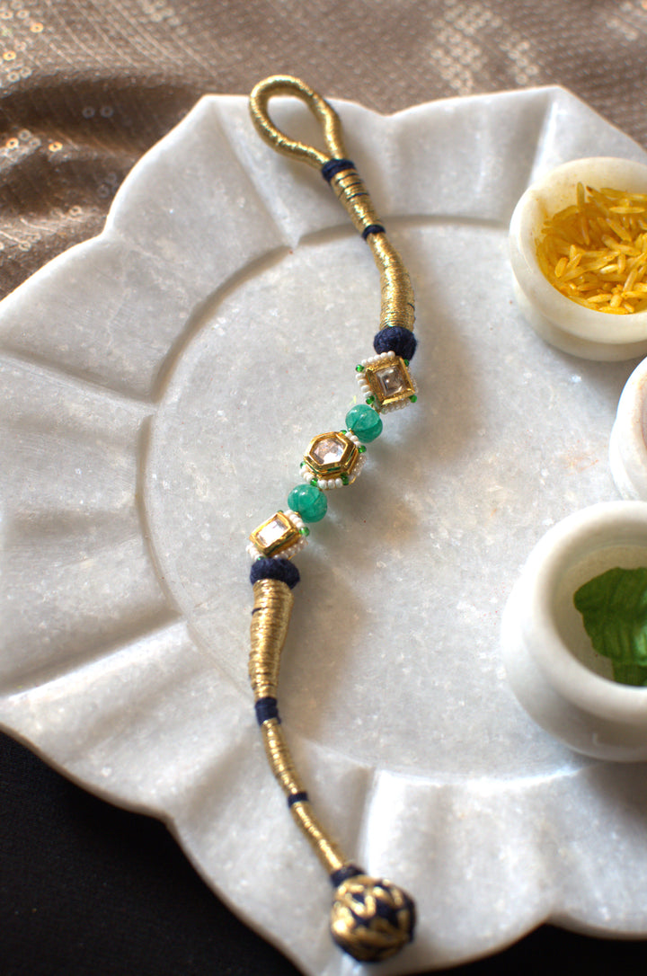 Blue and green polki rakhi bracelet